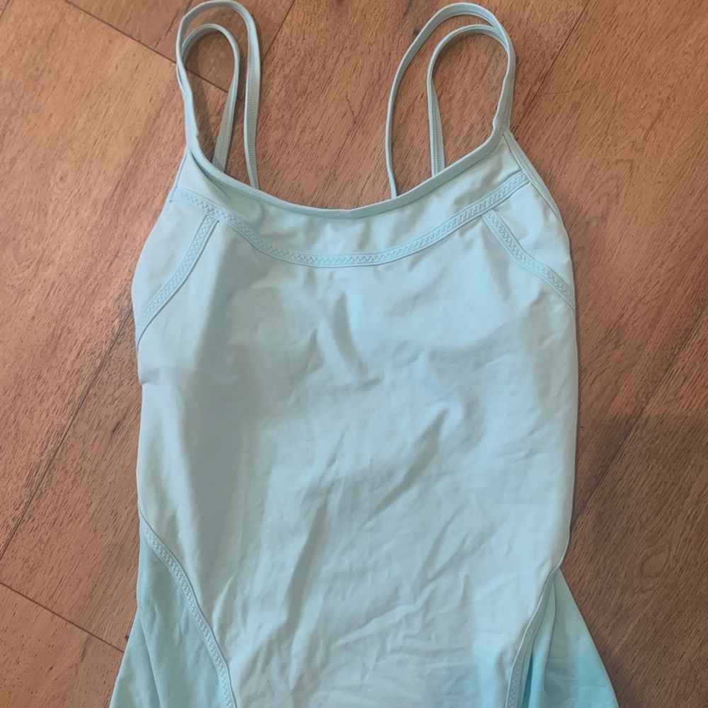 This is a teal Lululemon tank top with a built in bra that is a size 6.